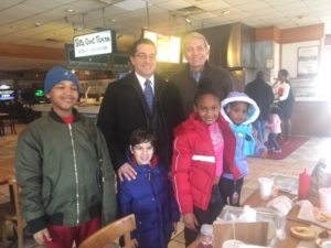 Bill Sianis graciously hosted the coat give-away event.