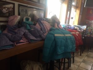 More than 100 children received new winter coats.